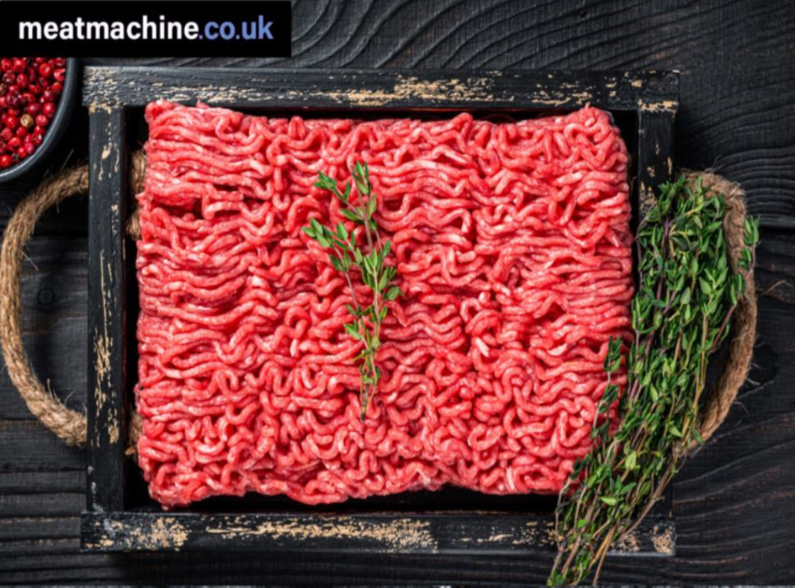 Fresh raw British steak mince arranged neatly on a tray ready for cooking.

