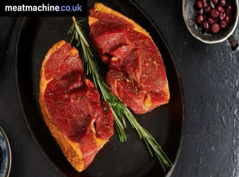 Premium British lamb steaks marinated in mint glaze, perfect for BBQs and oven cooking